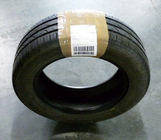 prawidłowo zapakowana opona DHL