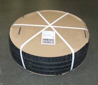 prawidłowo zapakowana opona DHL