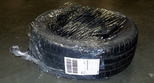 zle-zapakowana-opona-dhl-2